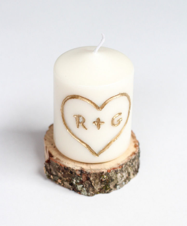 27 DIY Valentine's Day Crafts - DIY candle with carved initials.