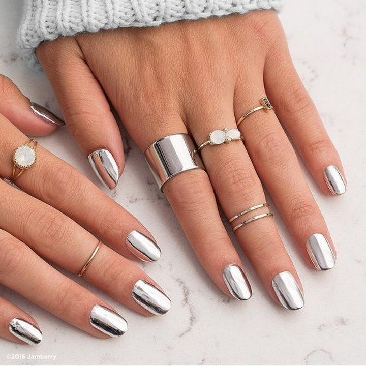 17 Chrome Nails - Silver chrome nails with some bling.