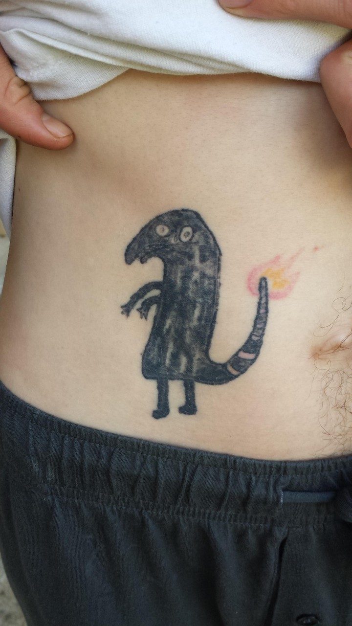 25 Funny Tattoo Fails - Even the most diehard Pokemon fans won't recognize this Charmander.