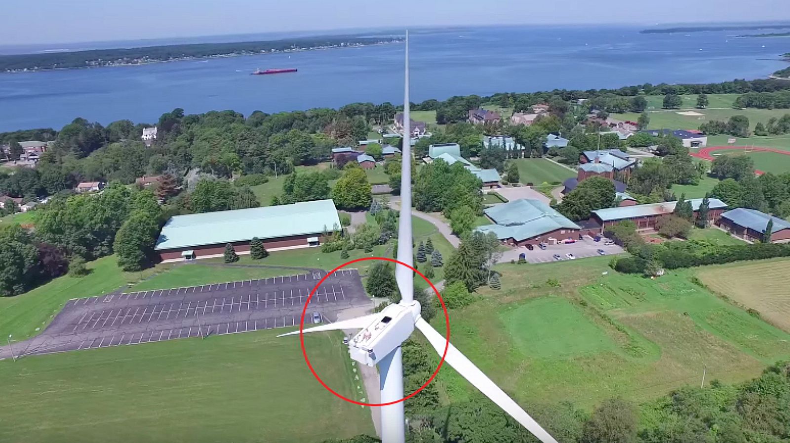 Drone Captures Man Sunbathing on a Wind Turbine.