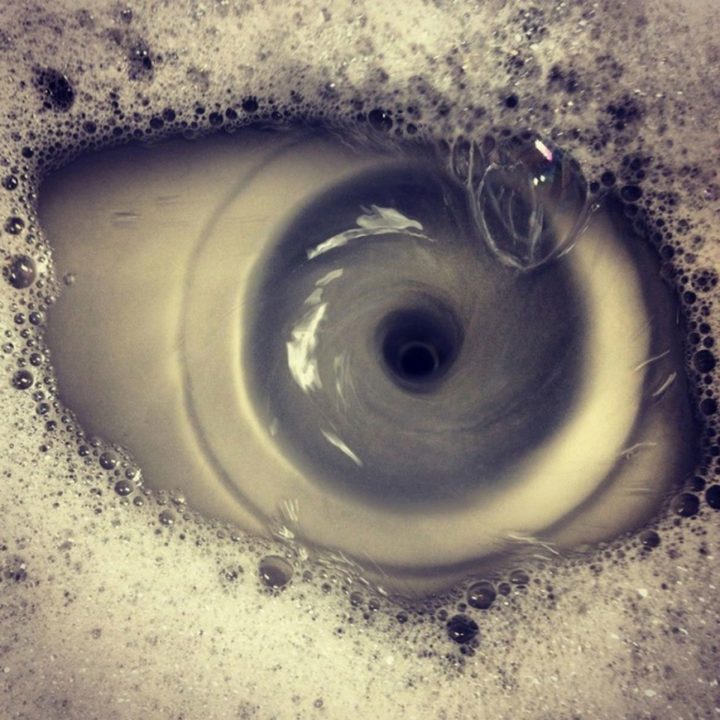 18 Perfectly Timed Photos - When you look into the sink and you have this feeling it is looking back at you.