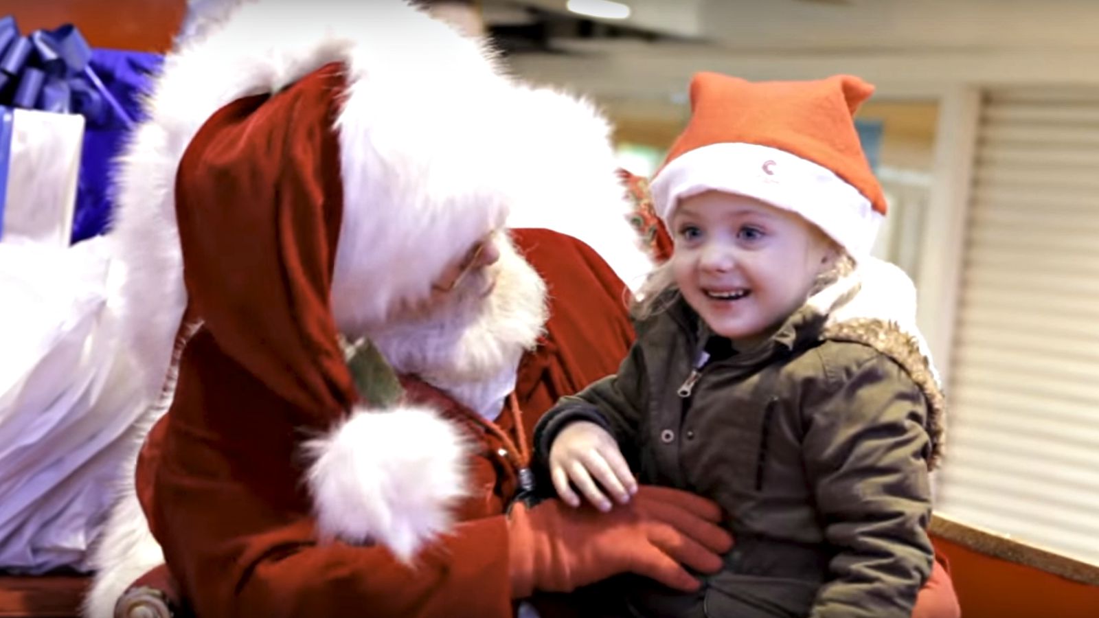 This Santa Signing with a Little Girl to Get Her Christmas Wish Will Melt Your Heart