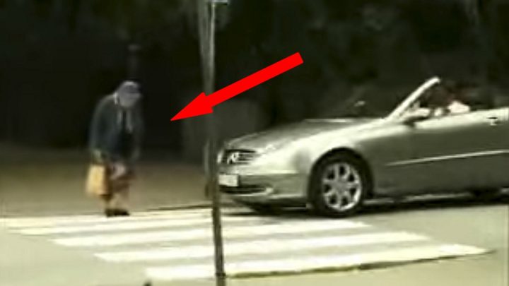 Elderly woman hits a car with her purse and gets her revenge at rude man honking his car horn.
