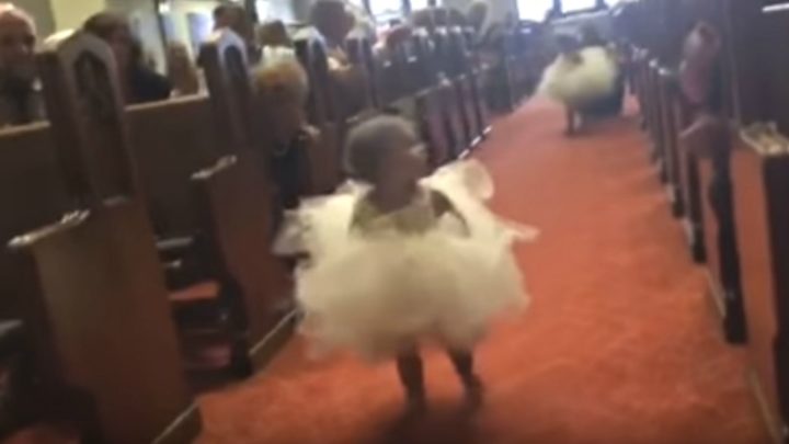Flower Girl Runs to Daddy the Groom.