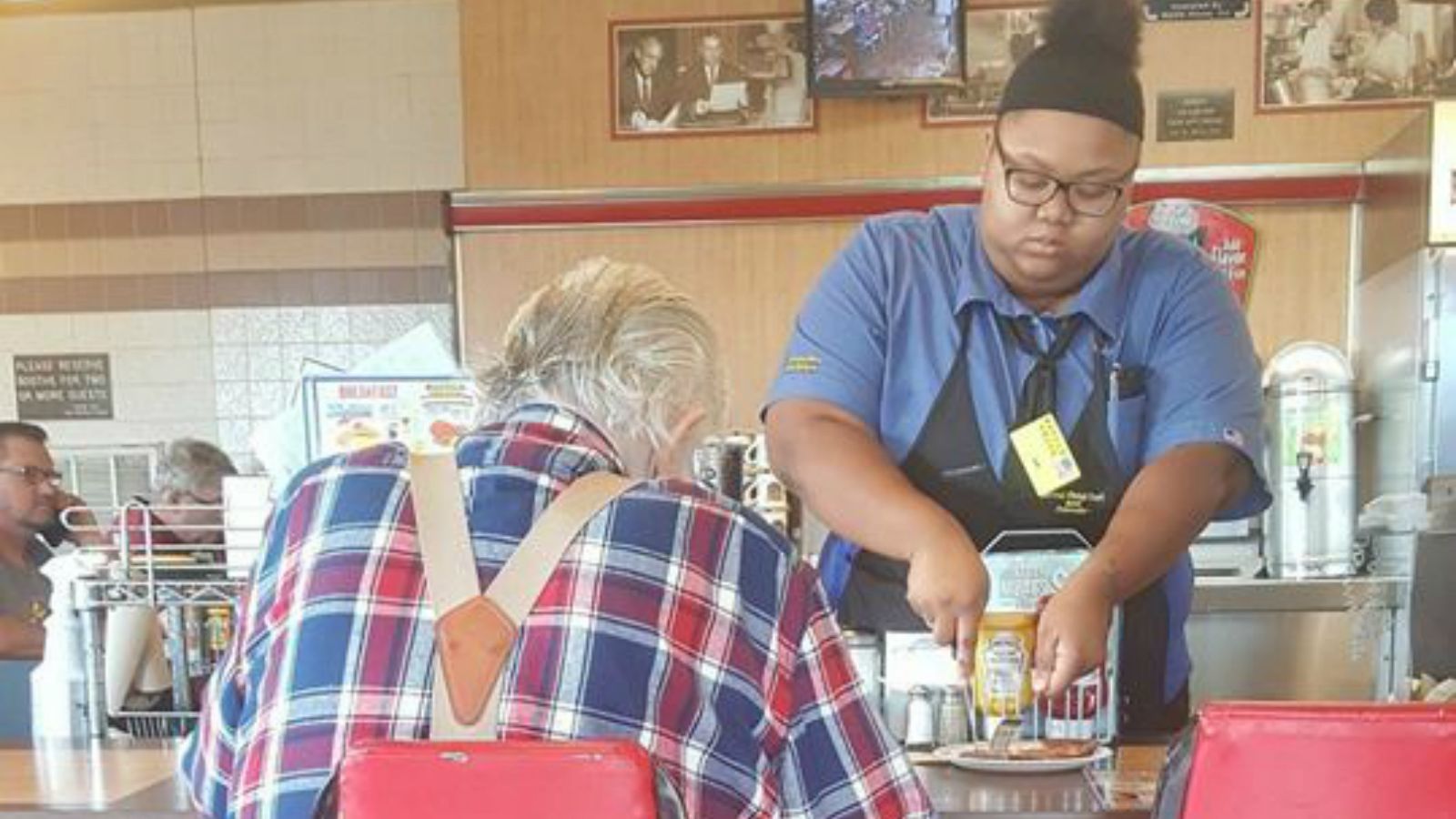 Waitress Helps a Customer with His Meal and Is Presented with a College Scholarship by the Mayor