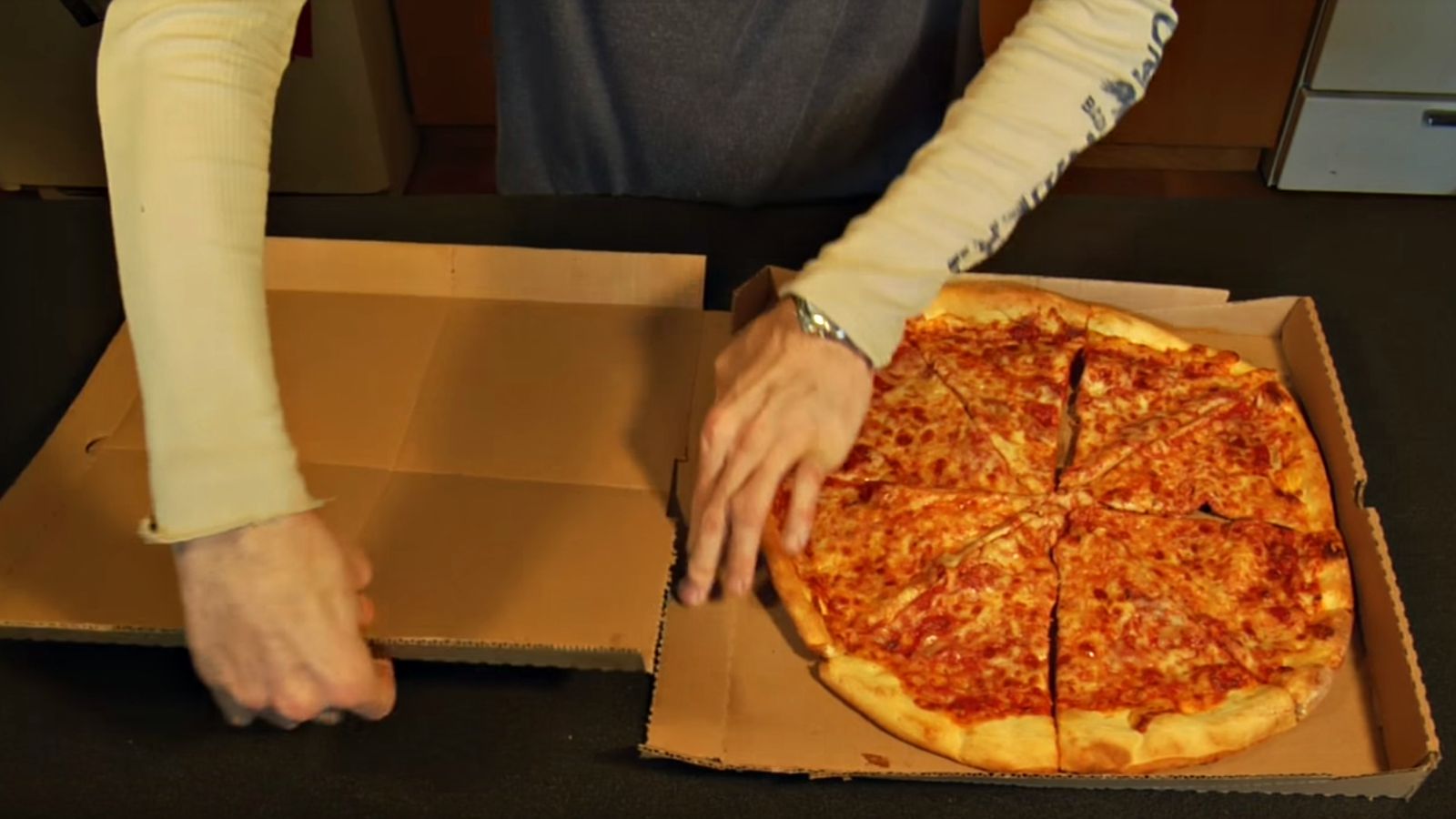 After You See What’s He’s Doing, You’ll Never Look at a Pizza Box the Same Way Again