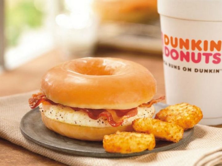 19 Ridiculous But Real Fast Food Items - Dunkin' Donuts Glazed Donut Breakfast Sandwich.