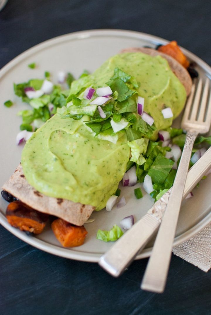 25 Healthy and Delicious Vegetarian Recipes - Sweet Potato Burrito Smothered in Avocado Salsa Verde.