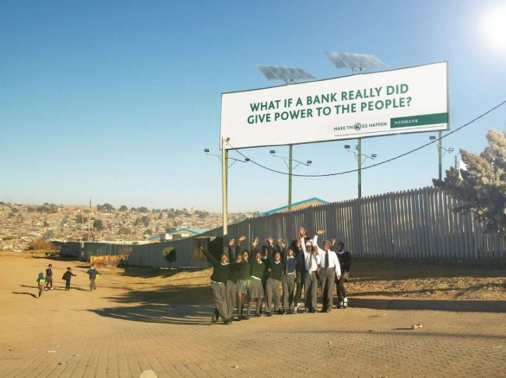 27 Awesome Billboards - Nedbank literally gives power to the people with a billboard with solar panels. The solar-powered billboard generates electricity for a small township in Africa as well as for the billboard illumination.