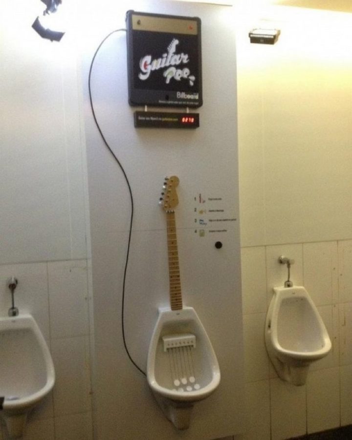 27 Awesome Billboards - Billboard Brazil lets guys be a Guitar Hero in public washrooms.