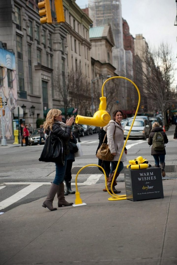 27 Awesome Billboards - Drybar's "Warm wishes from Drybar" advertising campaign uses a hair blower blowing hot air in the streets.