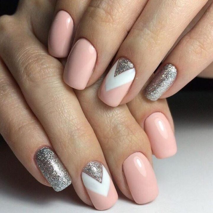 White, pink, and silver come together to create a spectacular manicure.