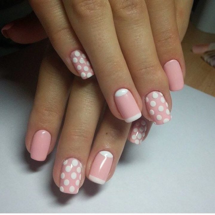 Elegant pink nails that are full of charm.