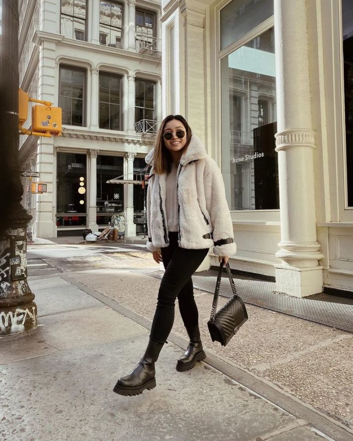 Wear faux fur like New York City-based influencer Alyssa Lenore who paired a light-colored jacket with some dark jeans.