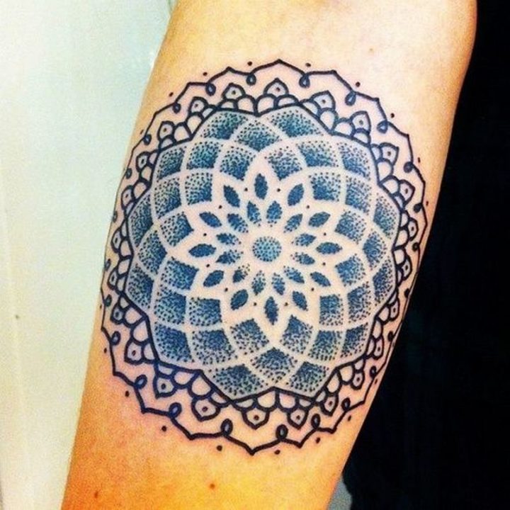 An intriguing blue and black tattoo.
