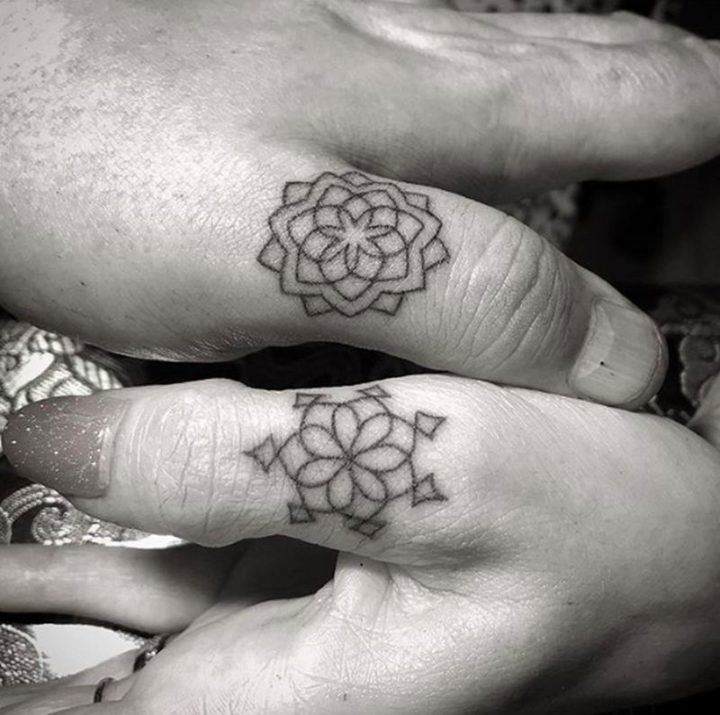 Lovely finger tattoos for couples.