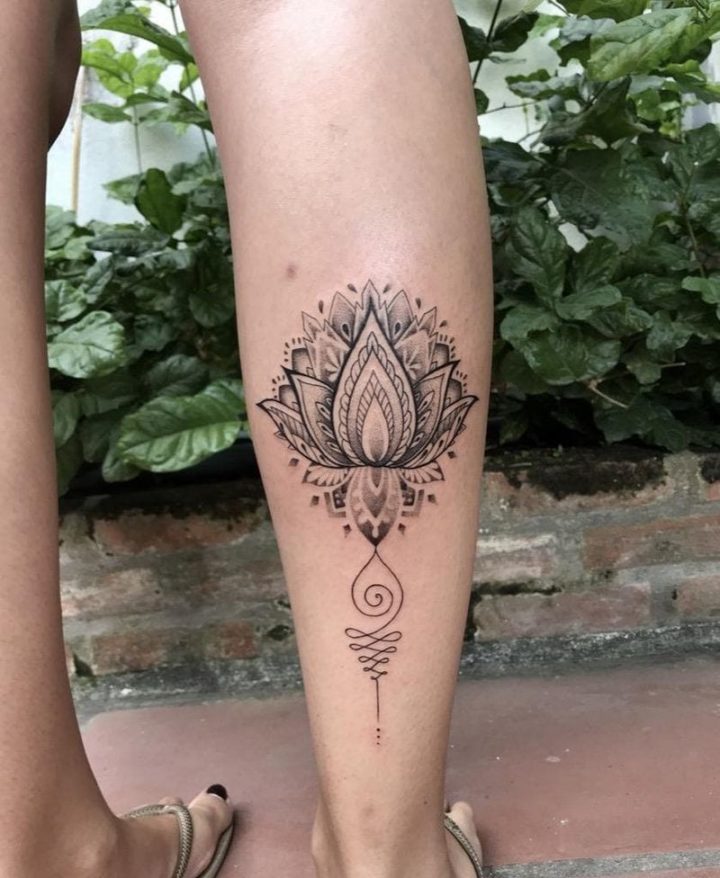 A beautiful leg tattoo with a feminine touch.