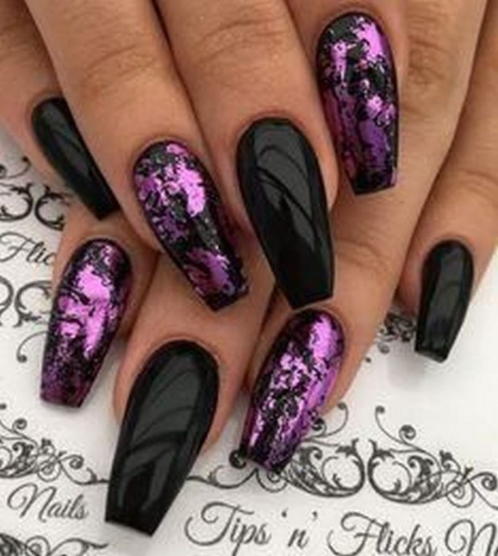 Stunning black nail designs for coffin nails.