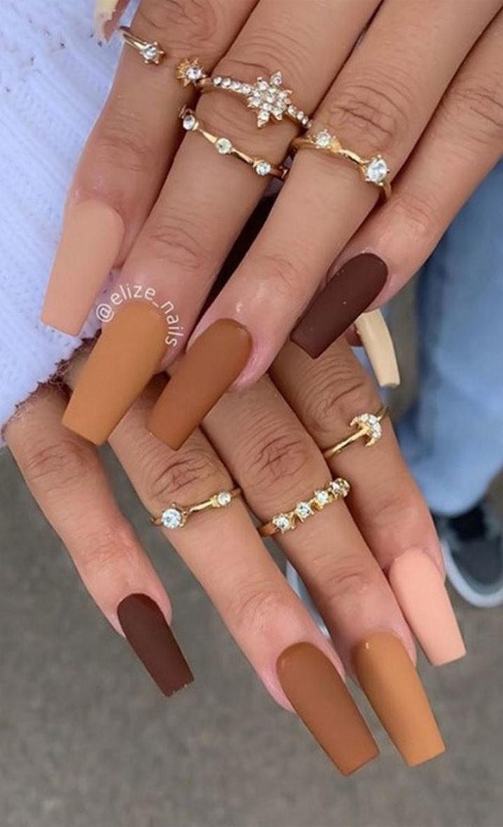 Gradient Brown Nail Design.