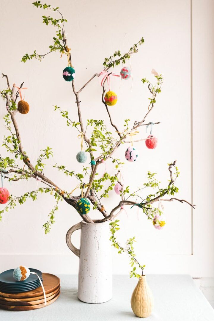 Pretty Easter tree with adorable Easter egg pom poms!