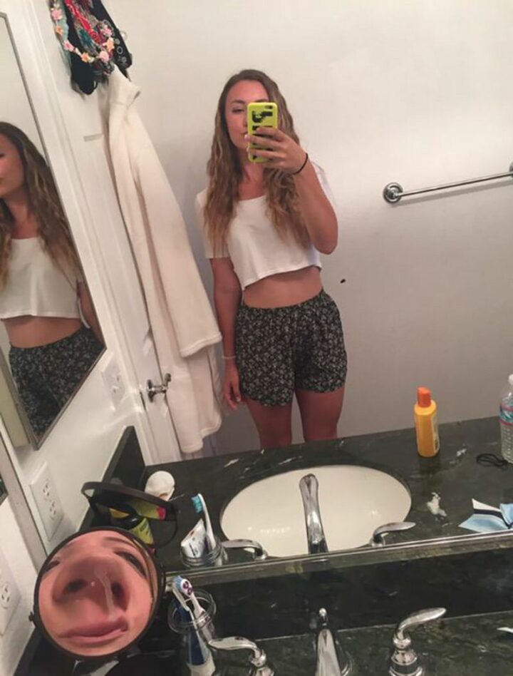 "Friend tried to take a mirror selfie...Look closely."